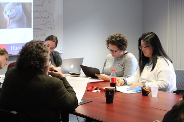 adults having a round table discussion