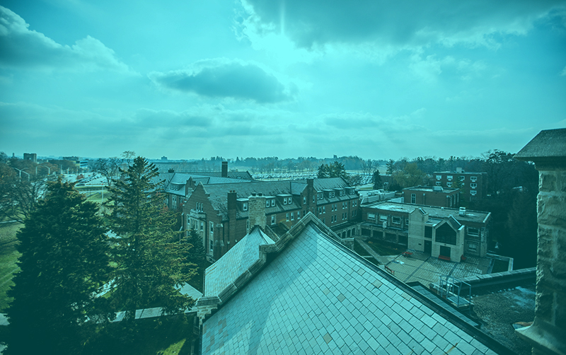 A photograph of the sky as viewed from the roof of the Huron building.