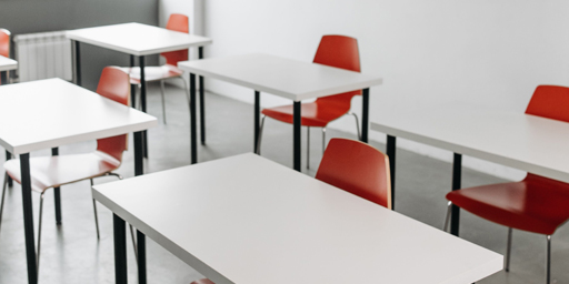 Sylvan Learning Banner Series of tables in a classroom