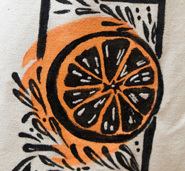 Image of screen printed orange on canvas